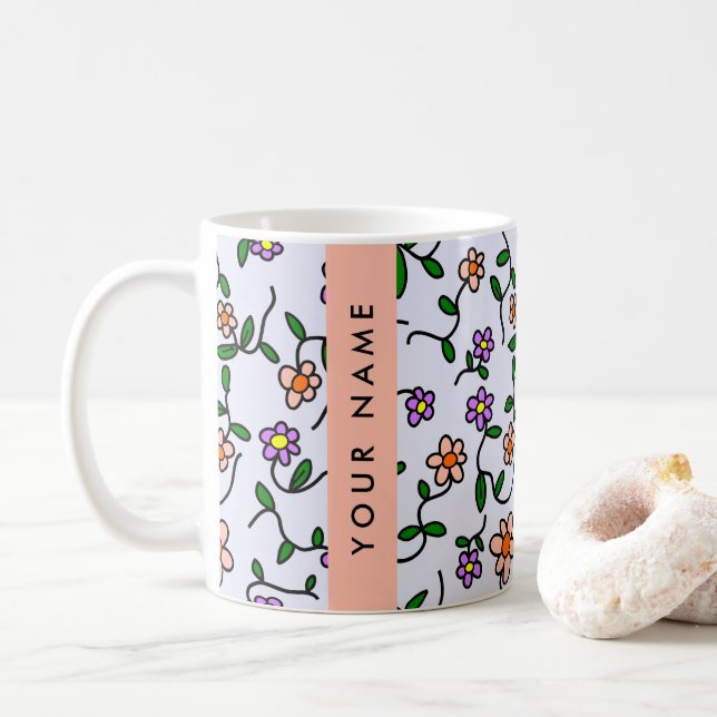 Färgglada blommor, blå bakgrund, orange kaffemugg (Med munk)