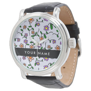 Färgglada blommor, blå bakgrund, svart armbandsur