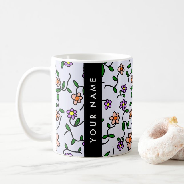 Färgglada blommor, blå bakgrund, svart kaffemugg (Med munk)