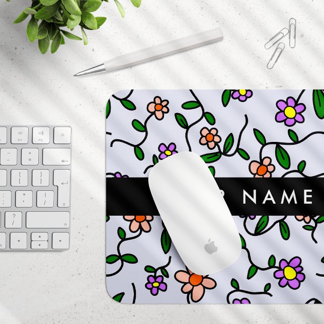 Färgglada blommor, blå bakgrund, svart musmatta (Skapare uppladdad)