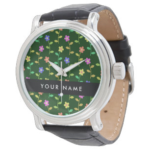Färgglada blommor, grön bakgrund, svart armbandsur