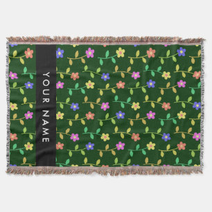 Färgglada blommor, grön bakgrund, svart filt