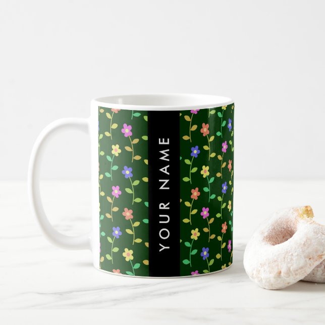 Färgglada blommor, grön bakgrund, svart kaffemugg (Med munk)