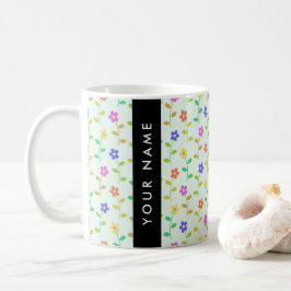 Färgglada blommor, ljusgrön bakgrund, svart kaffemugg