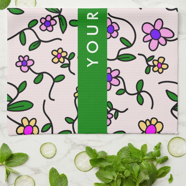 Färgglada blommor, rosa bakgrund, grön kökshandduk (Vikta)