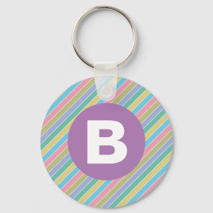 Färgglada diagonala godisränder Lila monogram Nyckelring