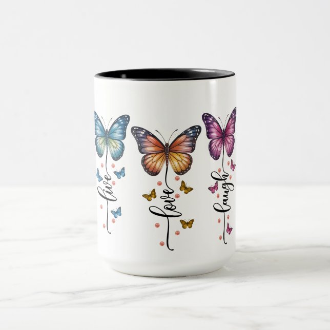 Färgglada fjärilstrio med Live Love Laugh-citat Mugg (Center)