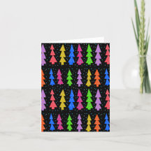 Färgglada julgranar på svart