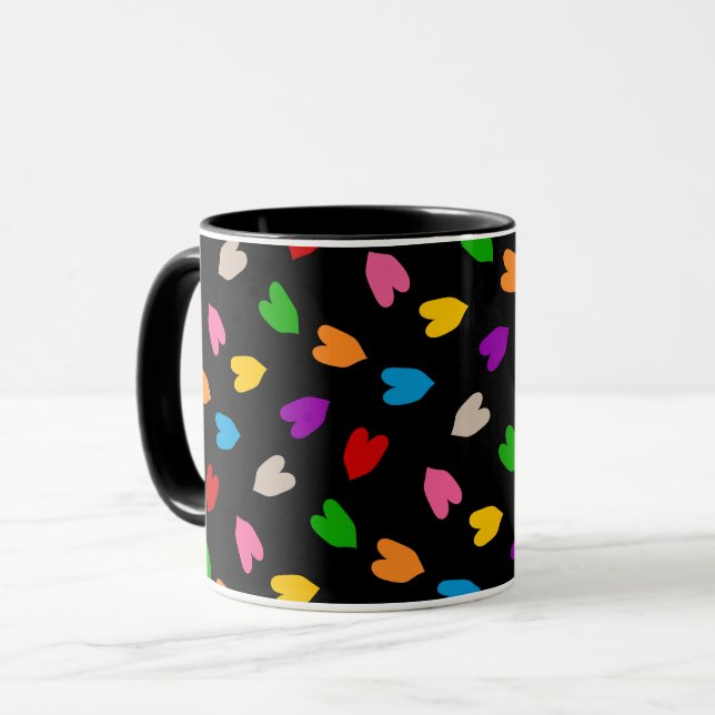 Färgglada kärlekshjärtsmönsterdesign svart  mugg (Framsida vänster)