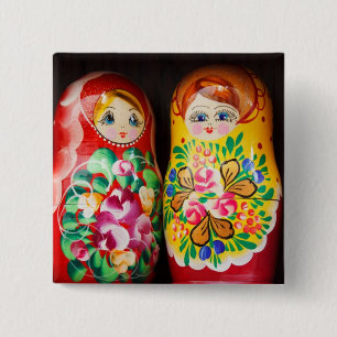 Färgglada Matryoshka-dockor Knapp