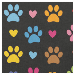 Färgglada tassavtryck och hjärtan på svart bomull tyg