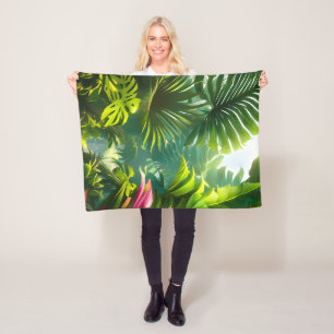 Färgglada tropiska blad och hibiskusblommor fleecefilt
