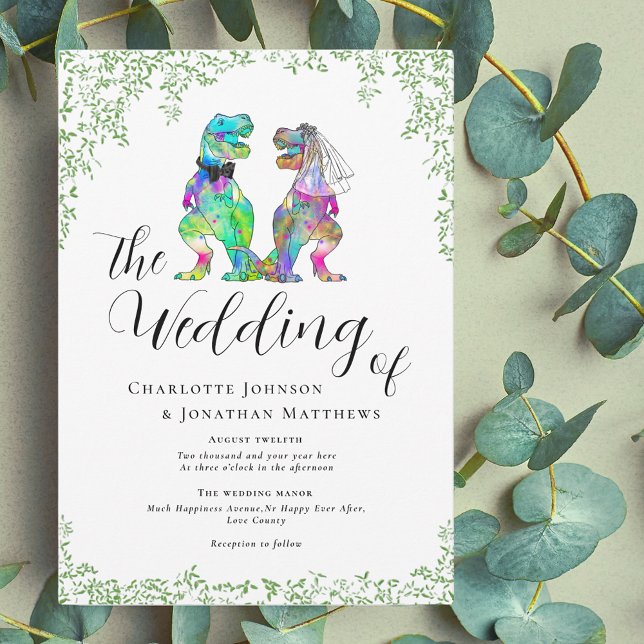 Färgglatt dinosaurie-tema bröllop inbjudningar (Dinosaur theme wedding invitation with script and watercolor botanical greenery)