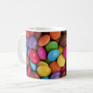 Färggodis, godisknappar, sötsaker, mat kaffemugg