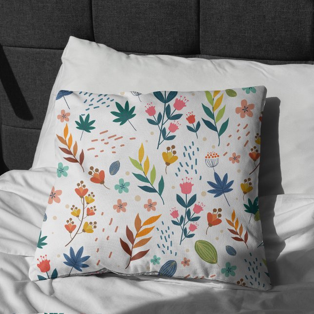 Färglös Blommigt Skriv ut Kudde (Colorful Floral Print Pillow on bed)