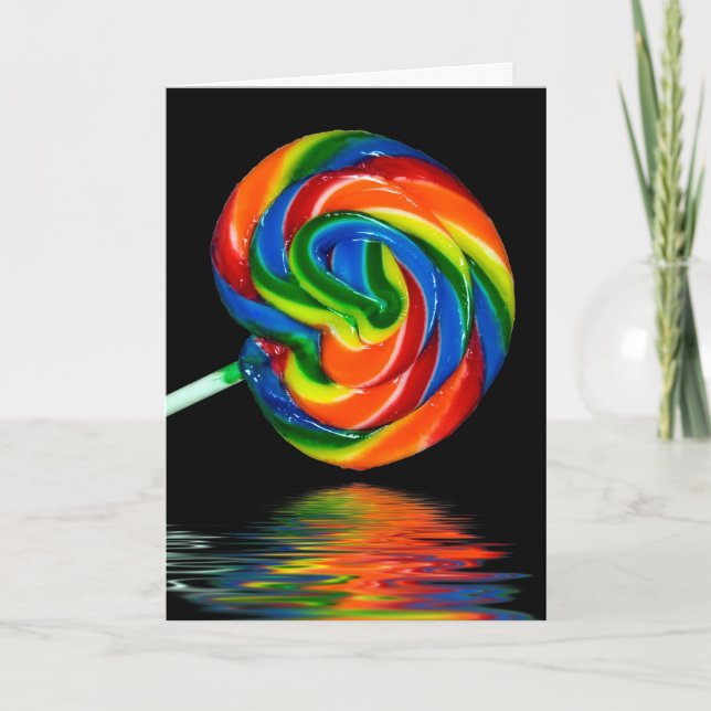 färglös lollipop på svart kort (Framsida)