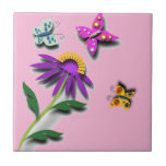 Färglöst fjäril och blomma kakelplatta<br><div class="desc">Denna vackra,  färgstarka fjäril och blomsterkeramik har vackra,  ljusa fjärilar som sjunker ovanför en blomma på en rosa bakgrund. En underbar underlägg för kaffet bord och en idealisk gåva till Mor-dagen,  eller en födelsedag.</div>