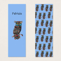Färglöst uggla på blå monogrambokmärke