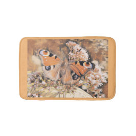 Färgning av en fjäril på orange på blommor badrumsmatta