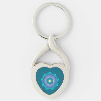 Färgrik mandala på blå bakgrund twisted heart silverfärgad nyckelring