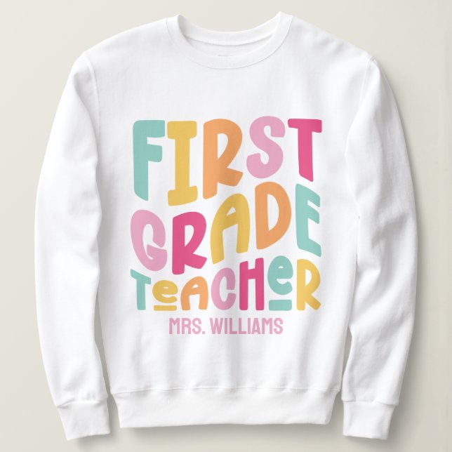 Färgrik textdesign för lärare i första klass t shirt (Design framsida)