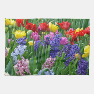 Färgrik vårblomsterträdgård kökshandduk