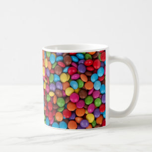 Färgrika sötsaker för rundachokladgodis kaffemugg