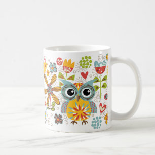 Färgrika ugglor och lycklig mugg för blommor