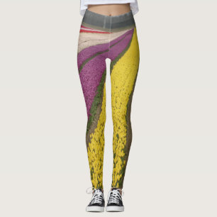 Färgrikt lägga benen på ryggen för tulpanfält leggings