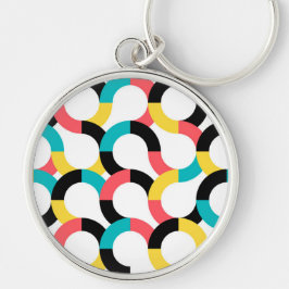 Färgstark, trendig, glad, roligt modern geometrisk rund silverfärgad nyckelring