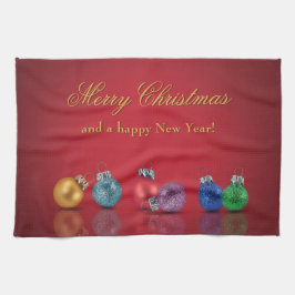 Färgstarka julprydnader vid Glitter Kökshandduk