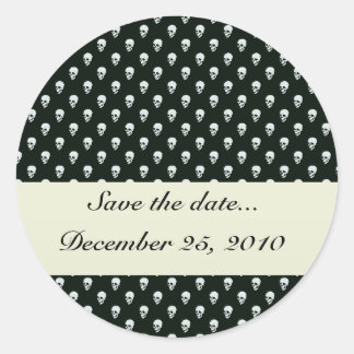 Farligt, vitt skalle på bakre svarta yta runt klistermärke