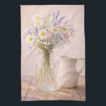 Farmhouse Wildflower Jar and Ceramic Pitcher  Kökshandduk<br><div class="desc">This farmhouse wildflower kitchen towel features a soft bouquet of daisies, lavender, and delicate pink flowers arranged in a clear glass jar beside a classic white ceramic pitcher. The warm rustic wooden table and gentle natural lighting create a peaceful cottage inspired scene. Perfect for farmhouse kitchens, dining rooms, bedrooms, or...</div>