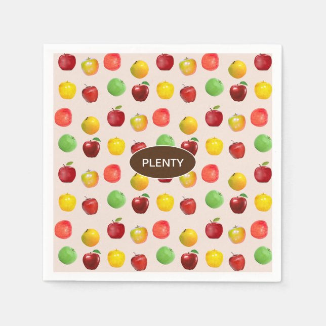 Färska färgade äpplen på ljussken pappersservett (Framsidan)