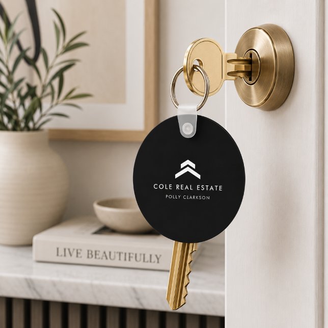 Fastighetsnyckelring | Mäklarens nyckelknapp Nyckelring (Black real estate logo keychain for polished closing gifts and property handovers.)