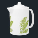 Feathery Fern på en Tekanna<br><div class="desc">Den här tekannans design baseras på en målning av två fern löv från mig. Med många-foldrar som är vackert placerade ser det ut som en fågels fjäder! Därav namn.</div>