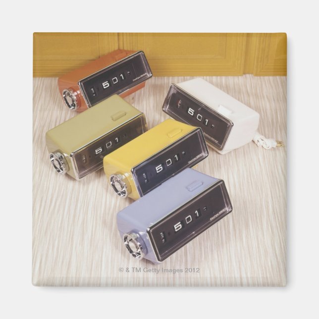 Fem klockor magnet (Framsidan)