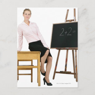 Female Teacher Posby Wooden Desk Vykort