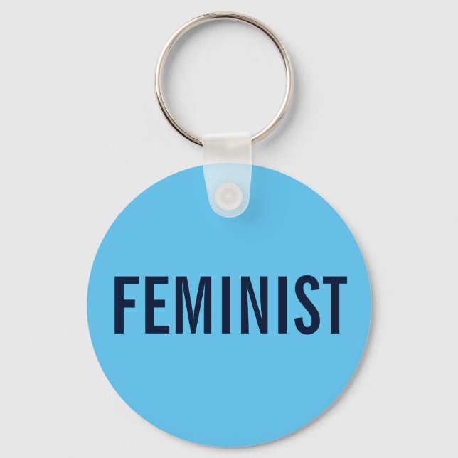 Feministisk, fetstilt text på himlar blå nyckelring (Framsida)