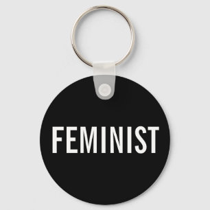 Feministisk, fetstilt vit text i svart nyckelkedja nyckelring
