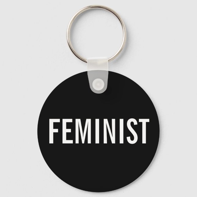 Feministisk, fetstilt vit text i svart nyckelkedja nyckelring (Framsida)