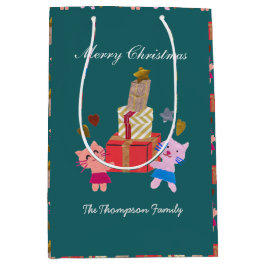 Festila katter med nuvarande grönt jul