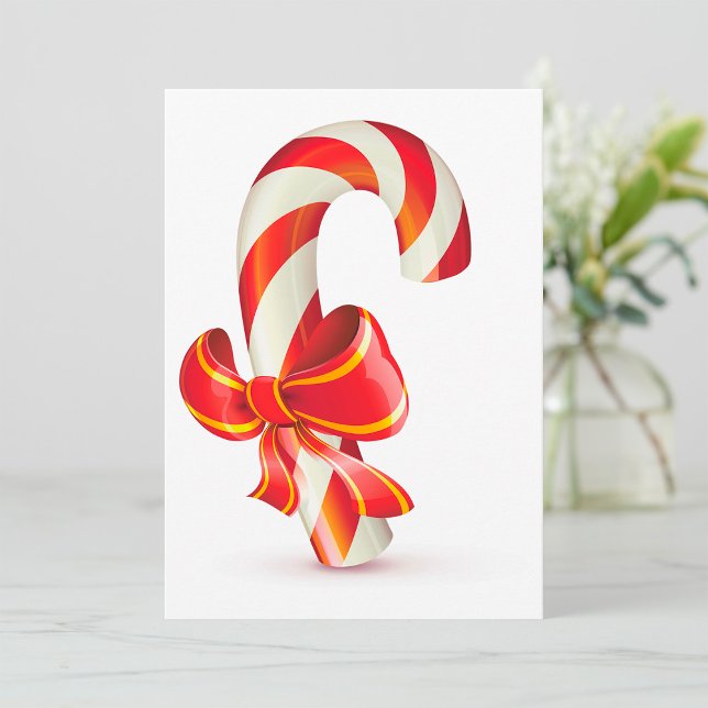 Festiv julgodisstav med röd slinga inbjudningar (Skapare uppladdad)