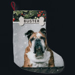 Festive Foliage Anpassningsbar Hund Photo & Namn Liten Julstrumpa<br><div class="desc">Festiv botanisk lövbeläggning med foto Julgrum. Lagringen kan anpassas med djurets namn och foto. En botanisk grönt vintern bladbakgrund med snö övertäckning. Husets namn visas på ett hund ben.</div>