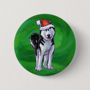 Festive Husky i Santa Hat på Grönt Knapp