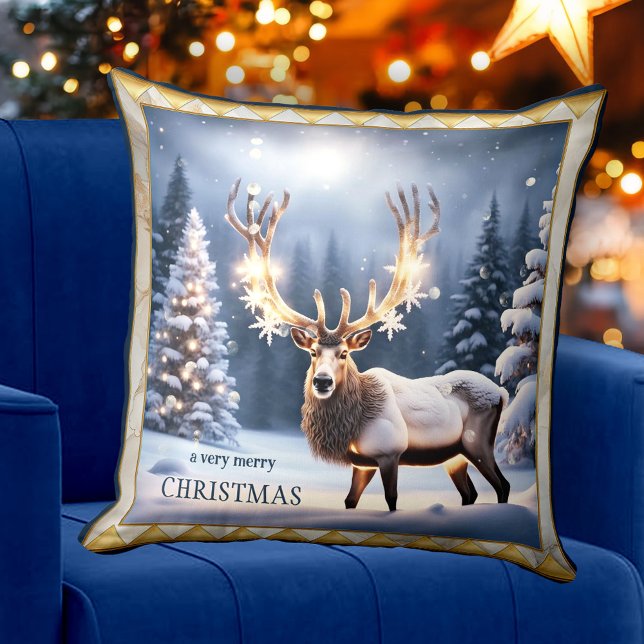 Festive Ljus Renor jul Animal Art Kudde (Christmas pillow featuring a festive reindeer with sparkling lights in a snow covered landscape )