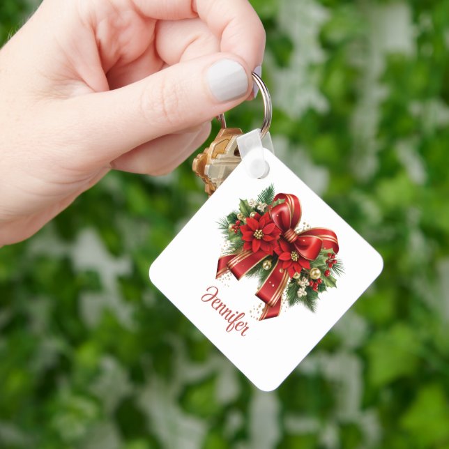 Festive Red and Guld jul Bow Nyckelring (Hand)