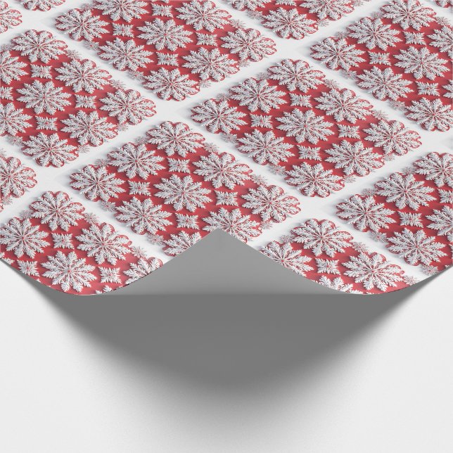 Festivt mönster av röda och vita snöflingor presentpapper (Hörn)