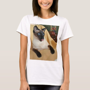 Festligt försegla pekar den Siamese katten som T-shirt