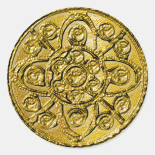 Filigree texturerat guld runt klistermärke